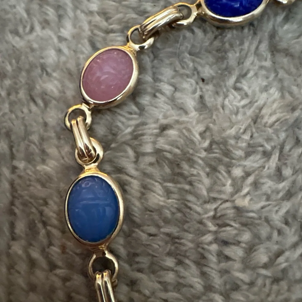 EUC multi stone gold tone bracelet